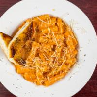 Rigatoni With Vodka Sauce · Rigatoni tossed in our own creamy vodka sauce. Served with garlic breadstick.