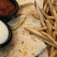 Quesadilla · Flour tortillas filled with mixed cheeses. Served with salsa and sour cream.