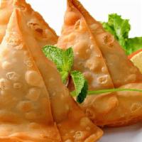 Aloo Samosa  · Delicious and crispy preparation filled with boiled potatoes and spices 3 pcs  served with m...