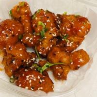 Sesame Gobi  · Cauliflower florets with honey soy sauce and topped with the sesame seeds