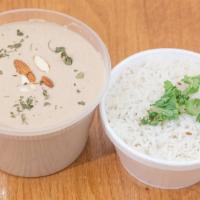 Shahi Lamb Curry · Boneless lamb cooked with fresh yogurt, coconut, almonds, cashew, ginger, garlic with herbs ...