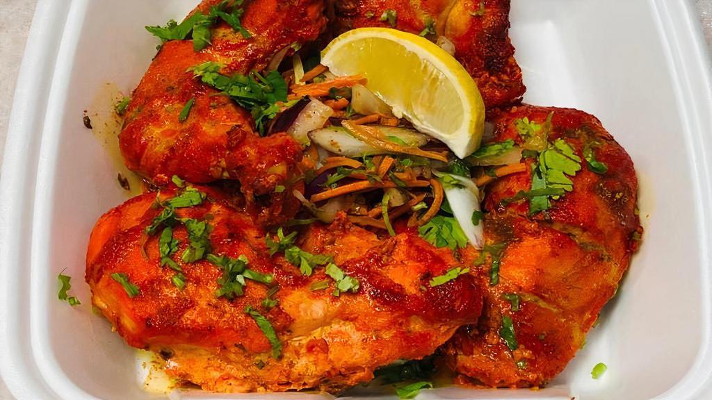 Tandoori Chicken Full · chicken marinated in yoghurt garlic ginger lemon juice and spice cooked in clay oven