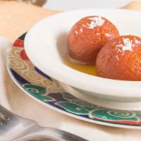 Gulab Jamun · Non fat dry milk & cottage cheese fried ball soaked in sugar syrup.