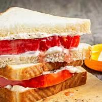 Tomato Sandwich · Heirloom Tomato on Lightly Toasted Hearty White, Mayo, Shaved Red Onion, Salt & Pepper, Fres...