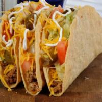 Taco Salad · Fresh lettuce mix topped with beef, then covered with black beans, shredded cheddar cheese, ...