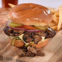 Mushroom Cheeseburger · Our flame-broiled burger smothered with sauteed mushrooms and the cheese of your choosing, g...