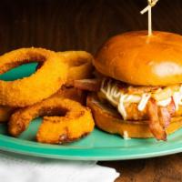 Chicken Bacon Melt · A lightly breaded chicken breast deep-fried to a golden brown, topped with bacon, melted Mon...