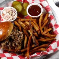 Pulled Pork Sandwich · Smoked for fourteen hours and pulled to order.
