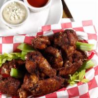 Wings · A pound of free-range chicken wings naked. Comes with Buffalo sauce and blue cheese or ranch...