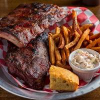 Bbq Ribs · Baby back ribs, dry-rubbed, smoked and finished on the grill.