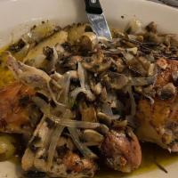 Chicken Vesuvio · Chicken sautéed with mushrooms, onions and potatoes in a white wine, oil and garlic sauce.