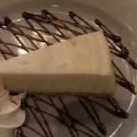 Cheese Cake · Slice. Classic cheesecake with a rich, dense, smooth, and creamy consistency.