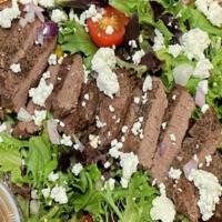 Filet Salad · A steak lover's dream! 4 oz. of top choice beef filet, cooked medium-rare, served upon a bed...