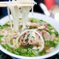 Combination Pho · Combination beef soup with  rare steak ,brisket ,tendon ,tripe and meatball.