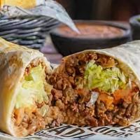 Burrito Loco · Best Seller. A flour tortilla grilled and stuffed with your choice of grilled chicken or ste...
