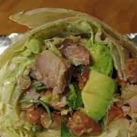 El Avocado Burrito · A large flour tortilla filled with seasoned ground beef or shredded chicken. topped with let...