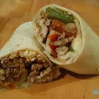 Burrito Mexicano · One burrito with beef chunks and sauce. Topped with cheese, lettuce, tomatoes and sour cream