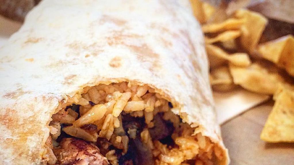 El Puerco Burrito · Pork meat in red sauce, rice, beans, cheese, pico de gallo and sour cream.