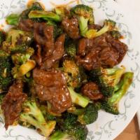 Beef With Broccoli · Served with rice.