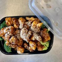 Sesame Chicken · Chunks of boneless chicken sauteed with broccoli in special  sauce.sesame on the top
