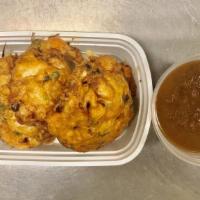 Vegetable Egg Foo Young · Served with rice.