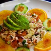 Ceviche · Fresh made ceviche with your seafood choice, mixed with onions, cucumbers and tomatoes, topp...