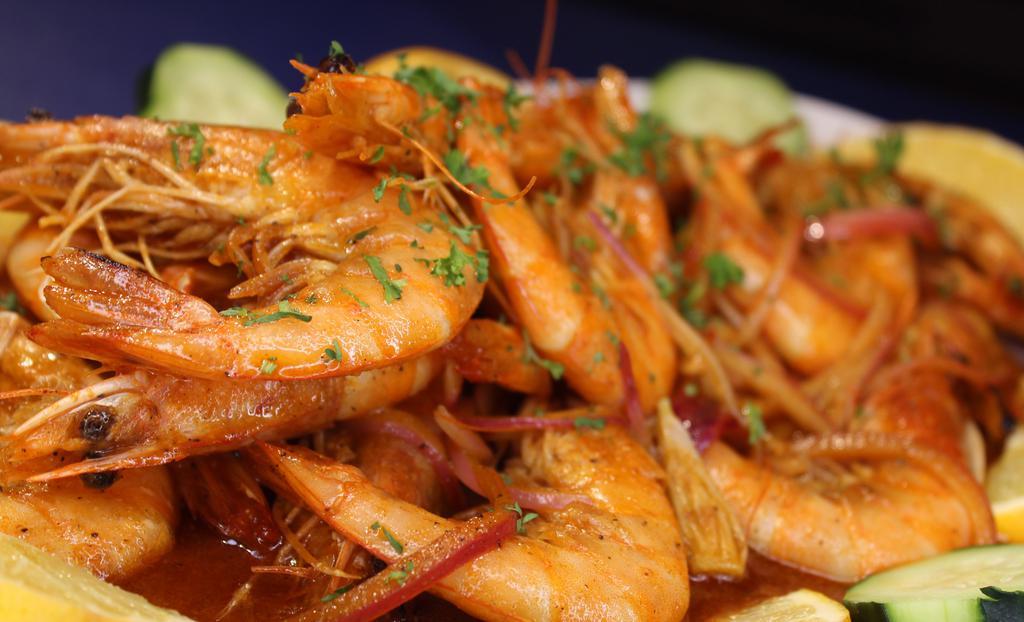 Camarones Cucaracha · 15 count Deep fried shell shrimps, cooked and our tasty and spicy Nayarit sauce. Bet you can’t eat only one!