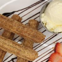 Churros · Sometimes referred to us a Spanish doughnut, this cinnamon and sugar coated fried-dough past...