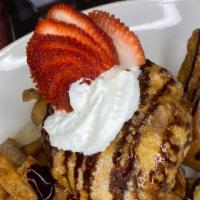 Fried Ice Cream · This traditional Mexican dessert is made from a breaded scoop of ice cream that is quickly d...