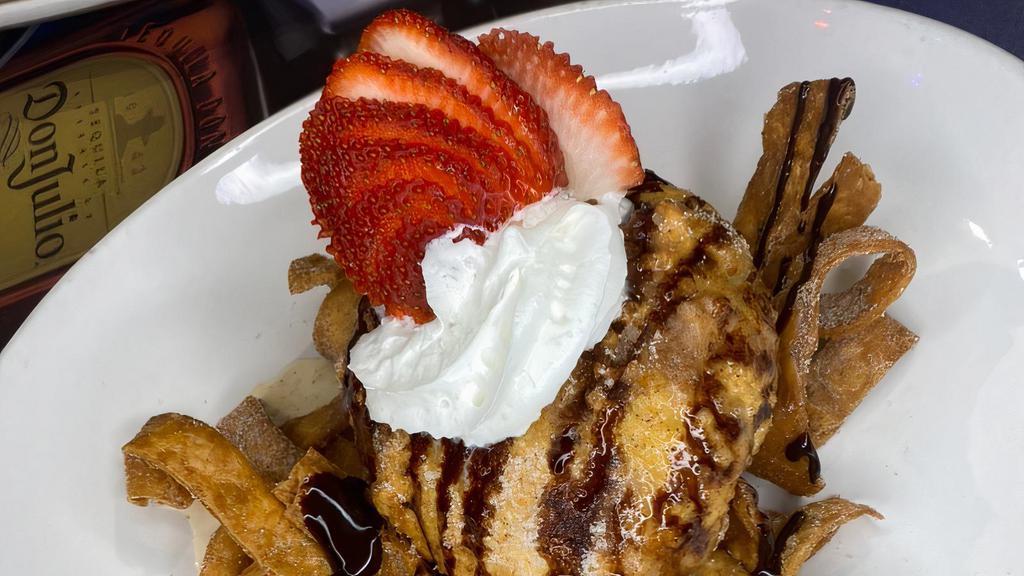 Fried Ice Cream · This traditional Mexican dessert is made from a breaded scoop of ice cream that is quickly deep-fried creating a warm, crispy shell around the still-cold ice cream. Served with whipped cream, chocolate and honey.