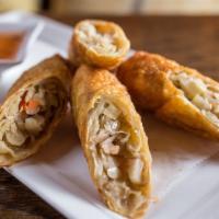 2 Piece Pork Egg Roll · Crispy pork egg roll with peanut butter in wonton skin, serve with sweet and sour sauce.