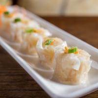 5 Piece Shumai · Spicy. Steamed shrimp dumplings with fried garlic served with homemade spicy soy sauce.