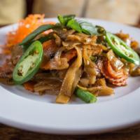 Drunken Noodle · Vegan, spicy. Wide rice noodle, carrot, bell pepper, green bean, sweet basil, tomato and jal...