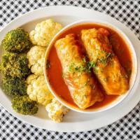 Stuffed Cabbage (2) · Served with two sides of your choice and 1 slice of rye bread.  
Your choice of beef or turk...