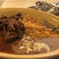 Chili Colorado · Grilled steak strips with red sauce served with rice, beans, three tortillas and your choice...