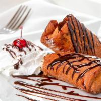Xango (Pronounced Chang-O) · Creamy cheesecake wrapped in a pastry tortilla, fried until flaky and golden and dusted with...