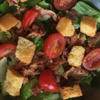 Blt Deluxe · Romaine and iceberg mix, bacon, grape tomatoes, and croutons with bourbon smoked paprika ran...