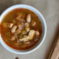 White Chicken Chili · A Southwestern Classic with Chicken, Onions, Beans, Green Chiles, & Lime