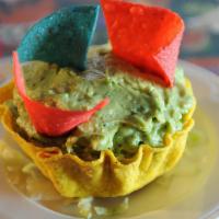 Guacamole & Chips · Our avocado dip made from ripe avocados, diced tomatoes, and sweet onions. / Nuestra salsa d...