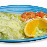 Enchiladas Suizas · Three enchiladas filled with chicken and spinach. Covered with Swiss cheese, lettuce, tomato...