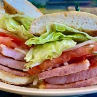 Ham Sandwich · Our famous ham sandwich, hand cut off the bone and piled high on your choice of bread.
