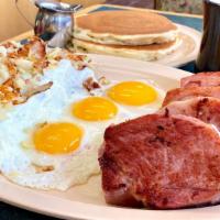3 Eggs Any Style · 3 farm fresh eggs and american fries. served with choice of toast or pancakes.