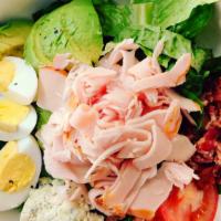 Cobb · Smoked turkey, tomato, egg, applewood bacon, bibb, romaine, blue cheese, and avocado with ch...