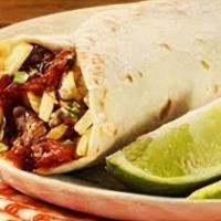 Philly Steak Breakfast Burrito · Scrambled eggs, grilled steak, sauteed green peppers, onions, mushrooms breakfast potatoes a...