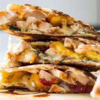 Chicken · Shredded chicken, grilled onions and peppers, chihuahua cheese melted in a flour tortilla, s...