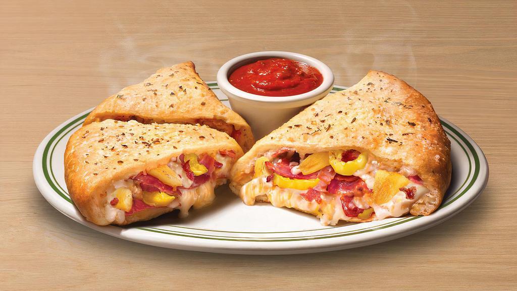 Create Your Own Calzone · Choose provolone or our 4-cheese blend and any three selections from our pizza toppings list. Served with your choice of ranch dressing, buttery garlic sauce or family recipe pizza sauce.