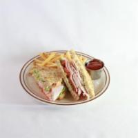 Turkey & Avocado (Gf) · lettuce, tomato & garlic-mayo on toasted gluten free bread. served with choice of kettle chi...