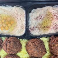 8 Falafels Plate · 8 falafel Served with rice, choice of two sides, and Pita bread and choice of 3 sauces
