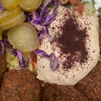 5 Falafel Bowl · Basmati rice topped with 5 falafel, hummus, Jerusalem salad, red cabbage, pickles and pita b...