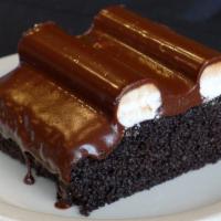 Sanders  Bumpy Cake · Devil's food cake with buttercream bumps and fudge icing.